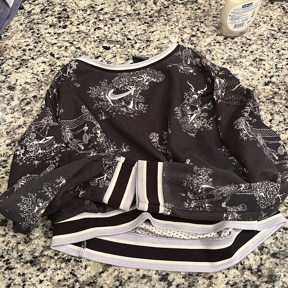 Black and lavender nike cropped long sleeve. Skeleton design.